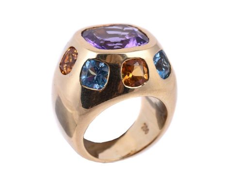 A multi gem dress ring, the domed panel with a central cushion cut amethyst, within a polished surround set with citrines and