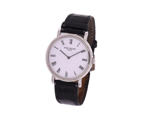 Y Patek Philippe, Calatrava, a white gold coloured wrist watch, circa 2000, automatic movement, 27 jewels, cal. 240, adjusted