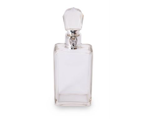 A large silver mounted lockable glass decanter and stopper by Hukin & Heath Ltd, Birmingham 1912, the clasp with an associate