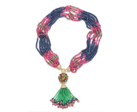 A ruby, sapphire, emerald and diamond tassel necklace, the necklace with alternating sections of ruby and sapphire beads, wit