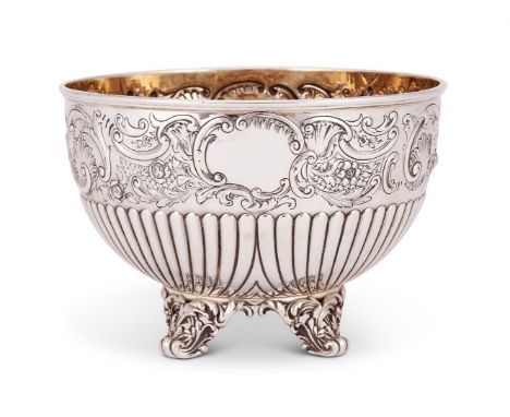 A late Victorian silver small hemispherical rose bowl by the Barnard Bros, London 1895, with a moulded rim, embossed with a b