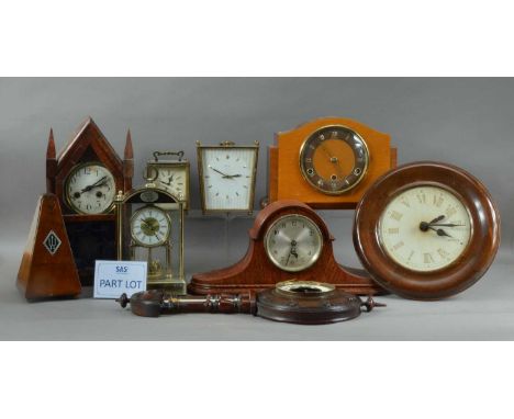 A large collection of clocks, including an early 20th century Napolean hat shaped mantle clock, with Arabic numerals, 37cm wi