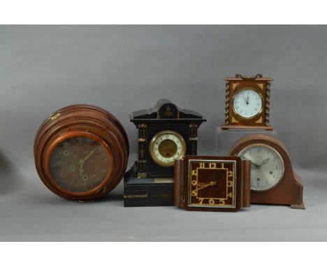 A collection of assorted clocks, inlcuding an early 20th century slate mantel clock, 34cm high, a clock in the form of a ship