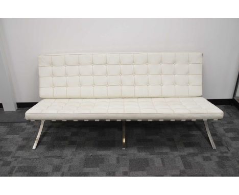 After Ludwig Mies Van De Rohe a Barcelona style sofa,  with white button back leather upholstery on a stainless steel frame, 