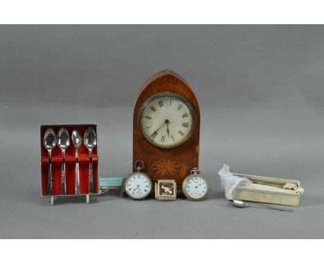 A mahogany mantle clock,  the dial with roman numerals, 22cm high, an ingersol stainless steel pocket watch, a continental si