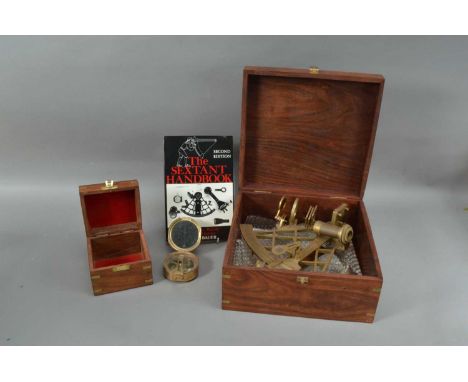 A sexton and compass, both in brass bound boxes, the largest box 13.5cm H x 28cm W (2)