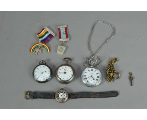 Two Masonic medals, on a rainbow silver and enamel, the other with a fob, together with a Trench watch with rolled gold, and 