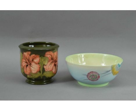 A modern Moorcroft small vase, green ground, signed to the underside, 12.5cm high, and a worn Clarice Cliff bowl, marked to t