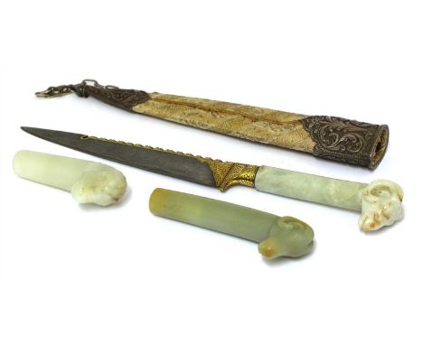 A Chinese dagger, in the Mughal style, the jade handle with a ram's head finial, the blade with gilt decoration, 30.8cm long,