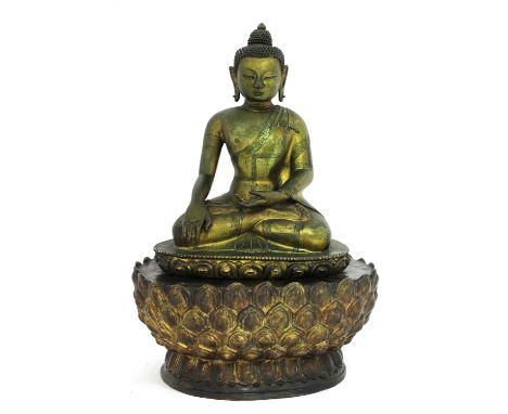 A Chinese Shakyamuni Buddha, 20th century, seated cross-legged in Bhumisparsa mudra on a lotus pedestal, his garment with scr