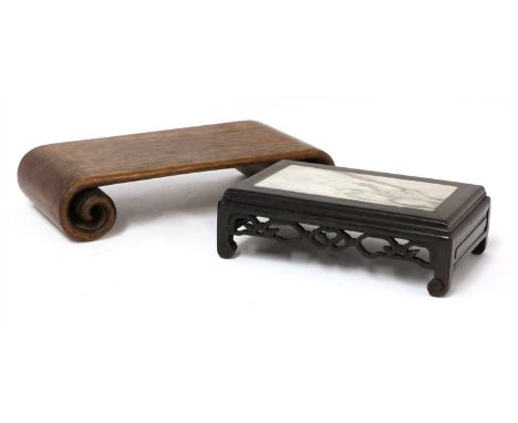Two Chinese wood stands, one of rectangular form, the apron pierced and carved with scrolls, the top inset with marble, 26cm 