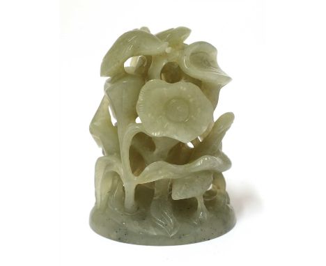 A Chinese jade cap finial, pierced and carved with egrets in a lotus pond, the stone of greyish-celadon tone, 6cm high