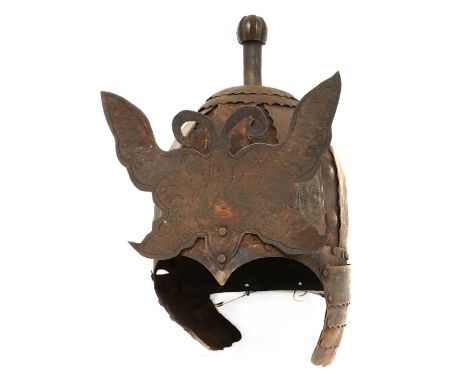 A Chinese iron helmet, 19th century, the skull consisting of eight plates decorated with rocks above waves, the top with a lo