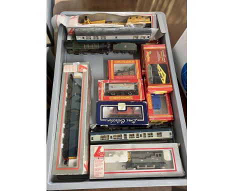A collection of model railway including Mainline loco and tender, boxed Hornby wagons also Lima and boxed Hornby buildings in