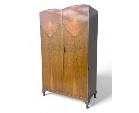 Ashton Leach & Cumberbirch Ltd., Rochdale - early 20th century walnut and mahogany gentleman's wardrobe, arched moulded top w