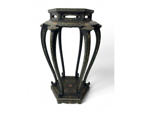 Chinoiserie design hexagonal jardinière stand, lacquered in black with gilt Greek key motif along the edge of the top, floral