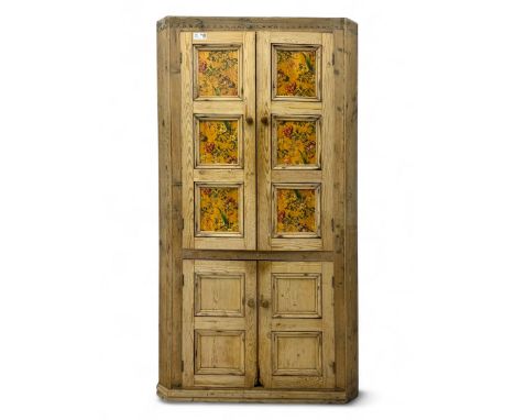 Victorian pine corner cabinet, upper section with twin panelled doors inset with six floral wallpaper panels, opening to reve