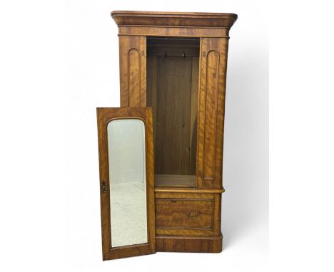 Mid-19th century figured mahogany single wardrobe, stepped cornice over mirrored single panelled door enclosing hanging hooks