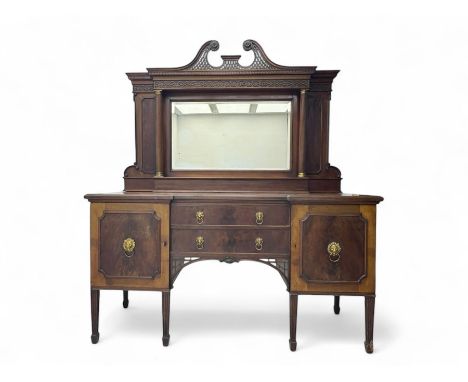 19th century mahogany sideboard, raised mirror back with carved fretwork and two fluted columns, above two cupboards and two 