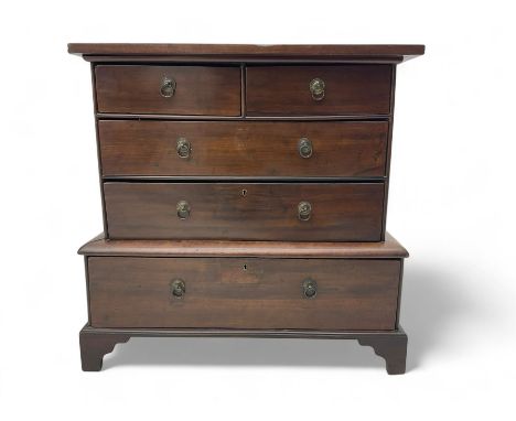 19th century miniature table top mahogany chest, rectangular top over two short and three long graduated drawers, raised on b