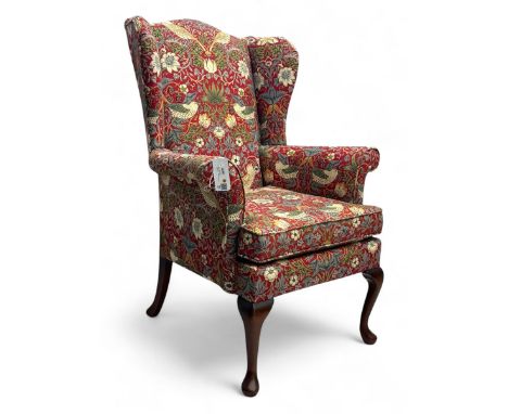 Georgian design wingback armchair, upholstered in Plumbs bird fabric, on cabriole front supports and splayed rear supportsDim