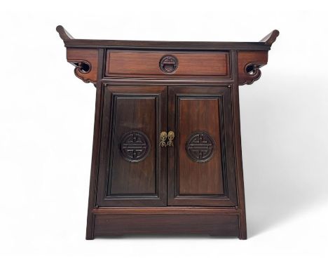 Chinese hardwood altar table, single drawer over double cupboard, two panelled doors carved with Shou motifsDimensions: Heigh