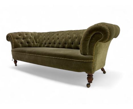 Victorian mahogany framed Chesterfield sofa, upholstered in green velvet with deep button back and scrolled arms with braid t