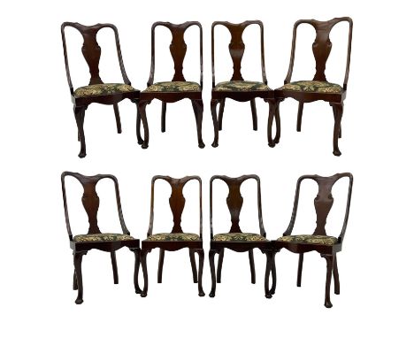 Set of eight late 19th century mahogany spoon back dining chairs, each with shaped top rail over Queen Anne design vase-shape