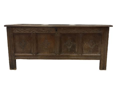 18th century oak coffer or chest, rectangular hinged panelled top with moulded frame enclosing candle box, the frieze carved 