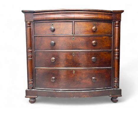 Victorian flame mahogany bow-fronted chest, moulded top over full width frieze drawer, fitted with two short and three long d