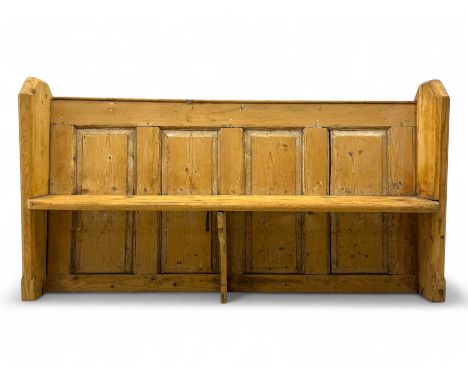 Late 19th century stripped pine hall bench, panelled backrest with shaped side supports, rectangular plank seat supported by 