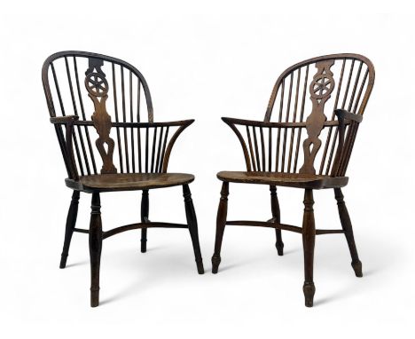 Near pair of early 19th century elm and ash Windsor chairs, high hoop and stick back with pierced wheel splat over a shaped d