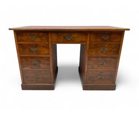 Late 19th to early 20th century walnut pedestal desk, rectangular top inset with red tooled leather writing surface, over a c