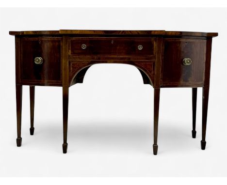 George III mahogany bow-fronted sideboard, serpentine-shaped top with crossbanded and boxwood stringing, over a central drawe