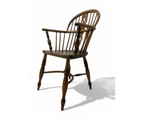 19th century Windsor armchair, hoop back with central pierced splat and turned spindles, shaped saddle seat on turned support