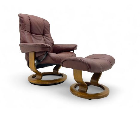 Erkonnes Stressless - swivel reclining armchair upholstered in brown leather with matching footstool, raised on beech circula