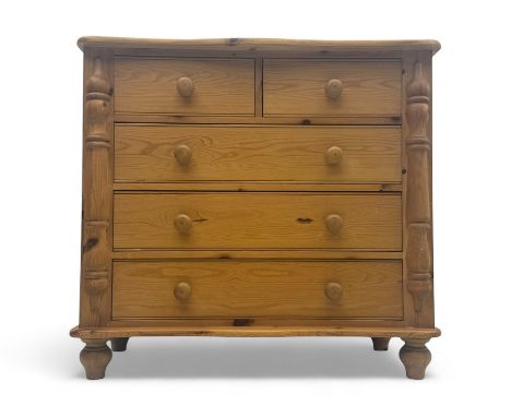 Pine chest of drawers, serpentine-fronted rectangular top over two short and three long drawers, flanked by turned baluster c