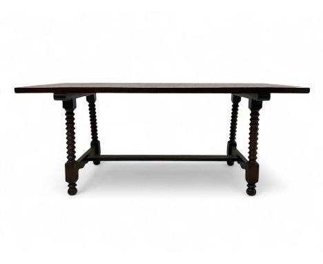 Late 19th century oak refectory table, rectangular top over turned bobbin supports united by H-stretcher, raised on ball feet