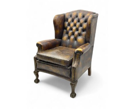 Georgian design wingback armchair, upholstered in distressed brown leather with deep-buttoned backrest and cushioned seat, ro