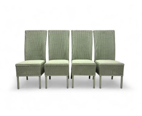 Set of four Lloyd Loom dining chairs, each with woven high back and seat in sage green finish, raised on matching painted tub