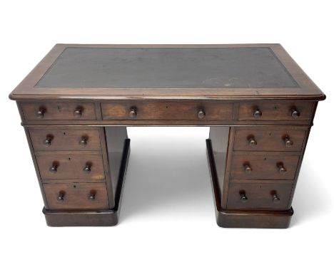 Victorian mahogany twin pedestal desk, moulded rectangular top with inset leather writing surface, nine drawers each fitted w