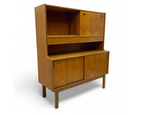 Nathan - mid-20th century teak cabinet, upper section with open shelving and fall-front storage over two drawers with recesse