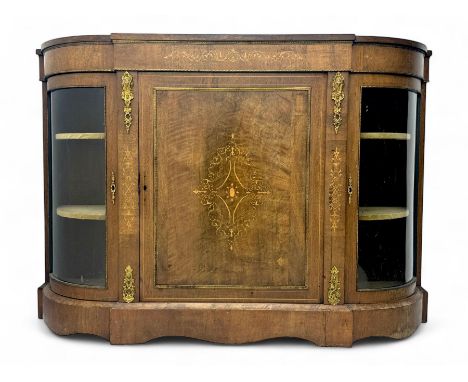 Late Victorian walnut bow-fronted credenza, central inlaid panelled cupboard door, flanked by curved glazed doors enclosing v