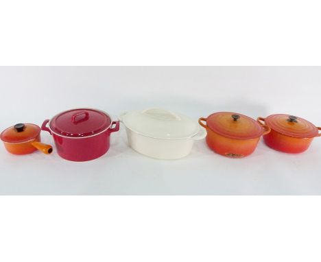 Large Maxwell Williams ceramic casserole, a cream cast iron casserole,&nbsp;two orange Le Creuset casseroles, the latter has 