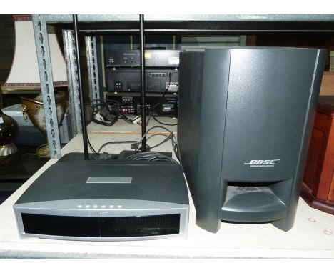 Bose CD player GSX series&nbsp;and a&nbsp;Bose Acoustimass speaker and two box multimedia speakers on stands&nbsp;