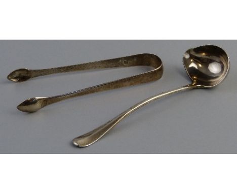 A toddy ladle, Old English pattern with lipped oval bowl, 16.5cm long, London 1932, together with a pair of Georgian bow suga