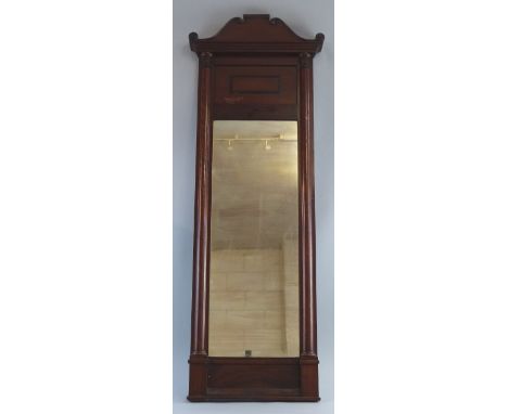 A William IV/early Victorian mahogany pier glass, of oblong form with scroll mounted swan neck pediment over a deep panelled 
