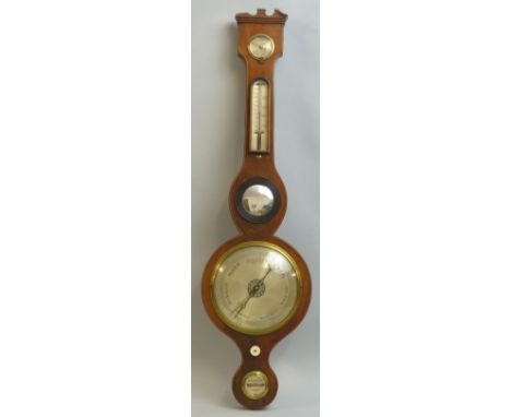 A 19th Century mahogany cased mercury barometer, by G Taroni Leek, the broken arched pediment over a humidity dial and arched