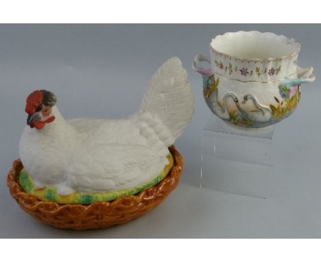A continental hen on nest tureen, with glazed osier moulded base and bisque cover, 27cm long and a Napoli jardiniere of bulbo
