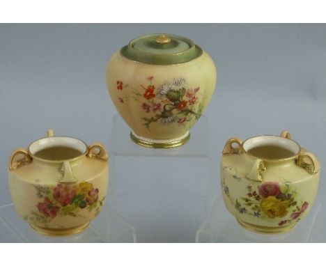 A pair of Royal Worcester blush ground vases, each of squat circular form with four loop handles painted with pink, yellow an